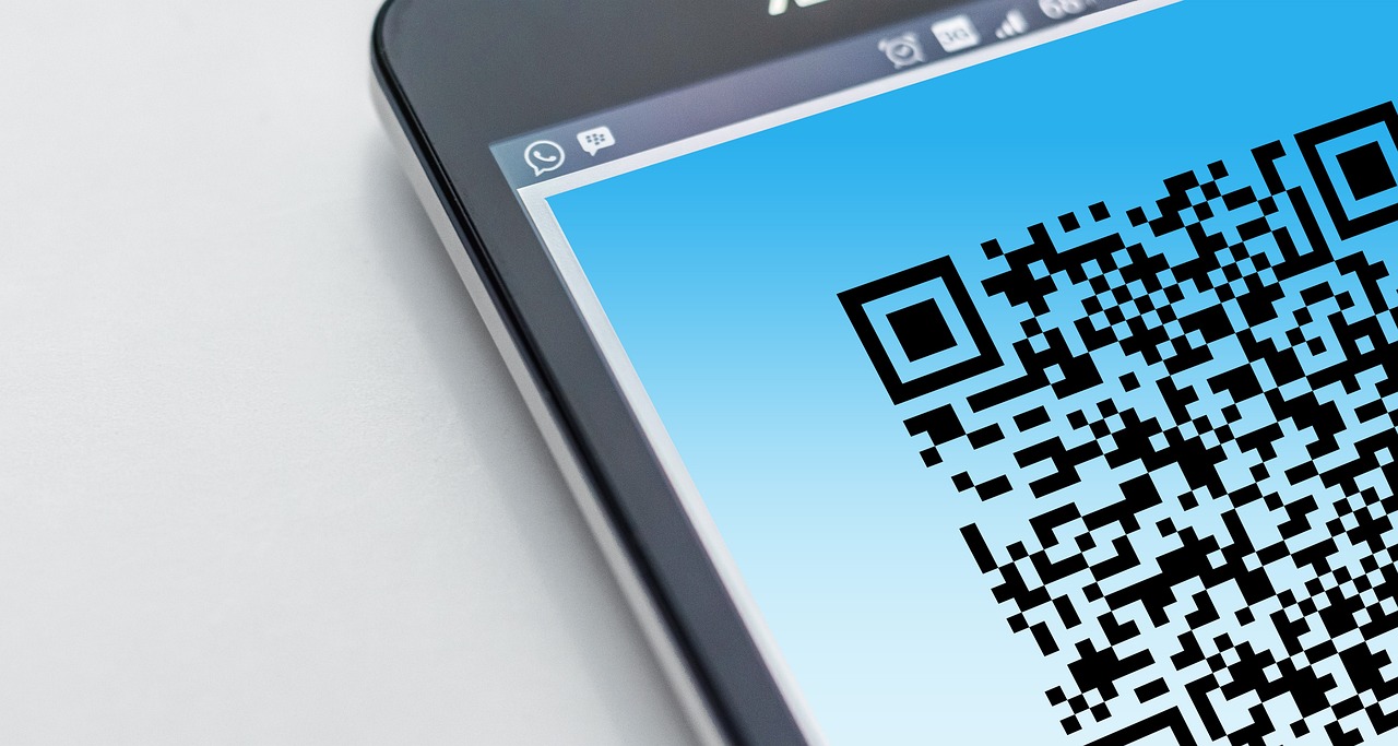 Smartphone screen showing a QR code close up, representing scanning products to check ingredients
