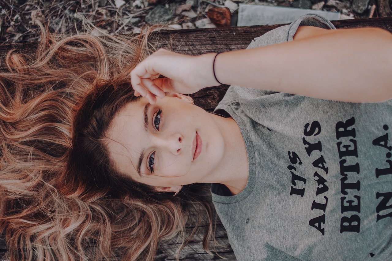 Beautiful woman's portrait, contemplating The Ordinary Alpha Arbutin 2% + HA safety for pregnancy skincare.