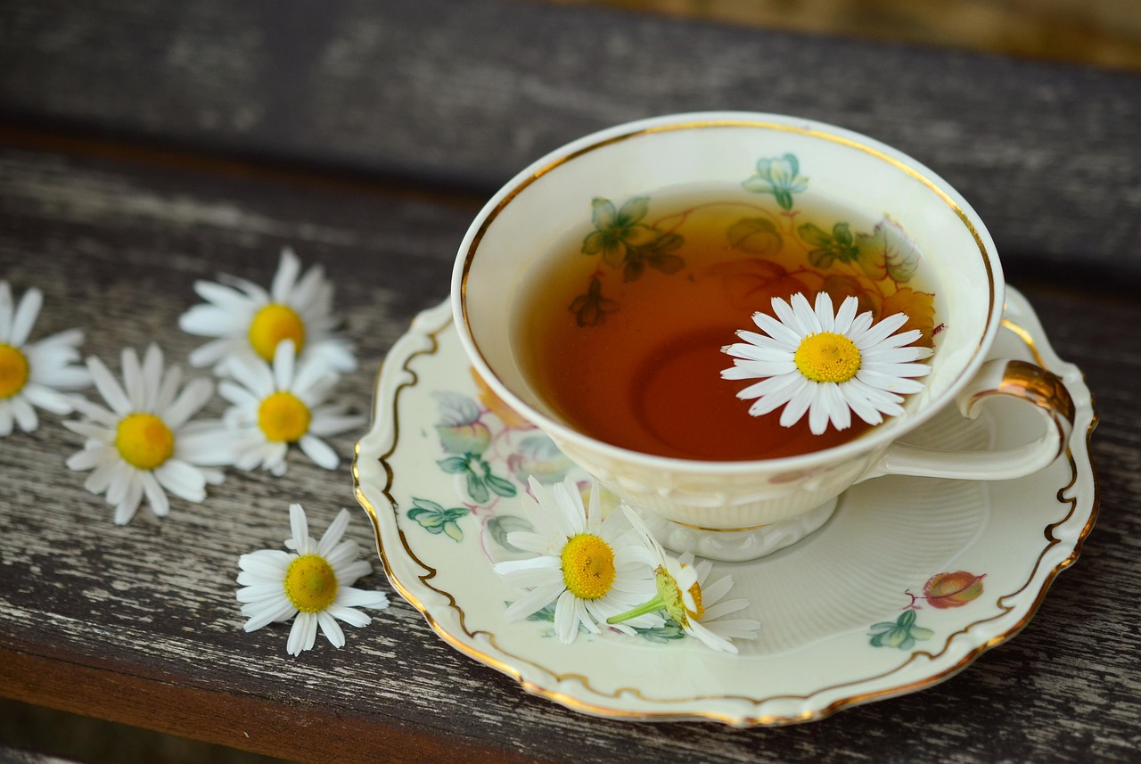 A porcelain cup of herbal tea, key to understanding herbal teas during pregnancy safety.