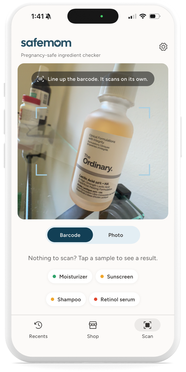SafeMom scan screen with a barcode viewfinder and a Barcode and Photo switch